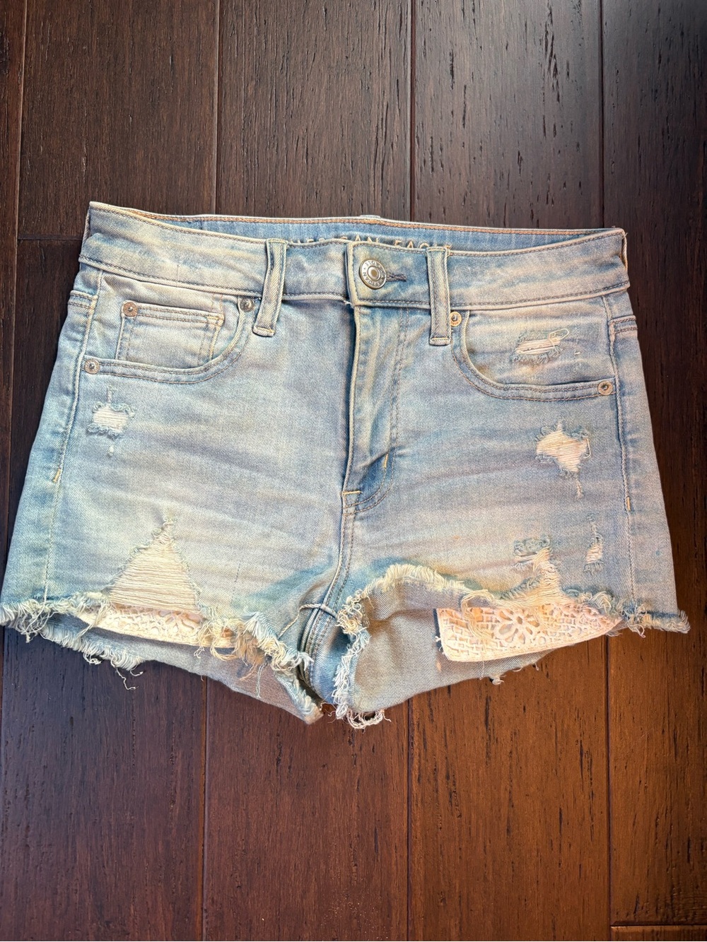 American Eagle Outfitters Light Blue Distressed Denim Shorts with Lace Inset